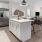 a kitchen with white cabinets