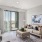 a living room with a large glass door