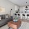 a living room with a couch and a table