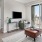 a living room with a tv and a couch