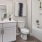 a bathroom with a tub toilet and sink