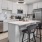a kitchen with white cabinets