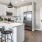a kitchen with white cabinets