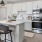 a kitchen with white cabinets
