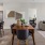 a kitchen with a table and chairs