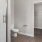 a bathroom with a shower and toilet
